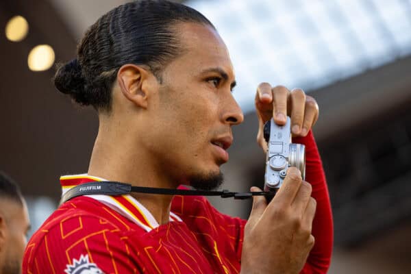 LIVERPOOL, ENGLAND - Saturday, May 18, 2024: Liverpool's captain Virgil van Dijk takes a photo with a Fuji camera during the FA Premier League match between Liverpool FC and Wolverhampton Wanderers FC at Anfield. (Photo by David Rawcliffe/Propaganda)