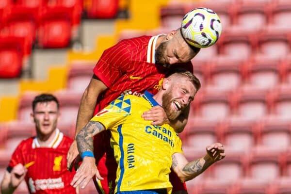 LIVERPOOL, ENGLAND - Sunday, August 11, 2024: Liverpool's Nathaniel Phillips (top) wins a header during a behind closed doors pre-season friendly match between Liverpool FC and Unión Deportiva Las Palmas FC at Anfield. (Photo by David Rawcliffe/Propaganda)