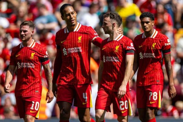 LIVERPOOL, ENGLAND - Sunday, August 11, 2024: Liverpool's Diogo Jota (R) celebrates with team-mate captain Virgil van Dijk after scoring the first goal during a pre-season friendly match between Liverpool FC and Sevilla FC at Anfield. (Photo by David Rawcliffe/Propaganda)