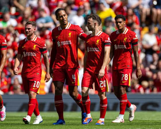 LIVERPOOL, ENGLAND - Sunday, August 11, 2024: Liverpool's Diogo Jota (R) celebrates with team-mate captain Virgil van Dijk after scoring the first goal during a pre-season friendly match between Liverpool FC and Sevilla FC at Anfield. (Photo by David Rawcliffe/Propaganda)