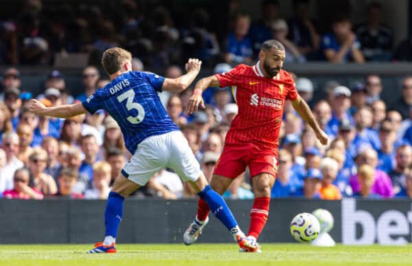 IPSWICH, ENGLAND - Saturday, August 17, 2024: Liverpool's Mohamed Salah (R) is challenged by Ipswich Town's Leif Davis during the FA Premier League match between Ipswich Town FC and Liverpool FC at Portman Road. (Photo by David Rawcliffe/Propaganda)