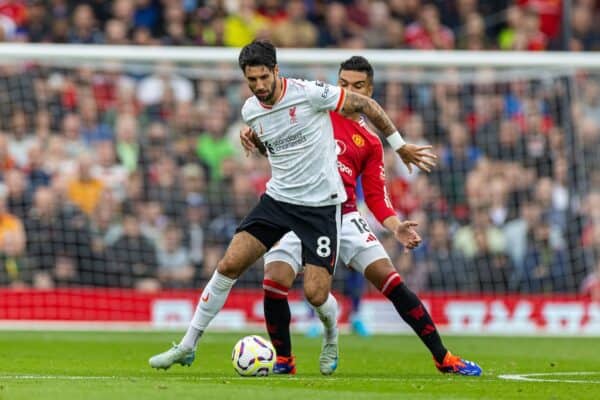 MANCHESTER, ENGLAND - Sunday, September 1, 2024: Liverpool's Dominik Szoboszlai (L) is challenged by Manchester United's Carlos Henrique Casimiro during the FA Premier League match between Manchester United FC and Liverpool FC at Old Trafford. (Photo by David Rawcliffe/Propaganda)