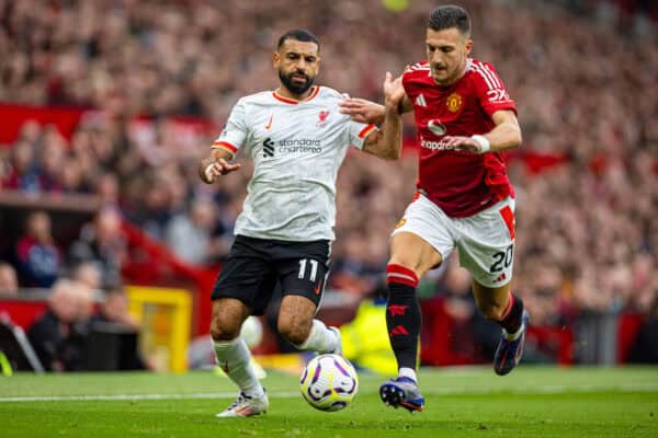 MANCHESTER, ENGLAND - Sunday, September 1, 2024: Liverpool's Mohamed Salah (L) is challenged by Manchester United's Diogo Dalot during the FA Premier League match between Manchester United FC and Liverpool FC at Old Trafford. (Photo by David Rawcliffe/Propaganda)