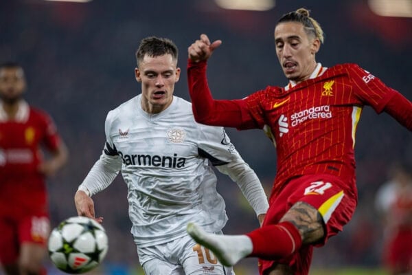 LIVERPOOL, ENGLAND - Tuesday, November 5, 2024: Bayer Leverkusen's Florian Wirtz (L) and Liverpool's Kostas Tsimikas during the UEFA Champions League game between Liverpool FC and Bayer Leverkusen at Anfield. (Photo by David Rawcliffe/Propaganda)