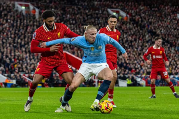 LIVERPOOL, ENGLAND - Sunday, December 1, 2024: Manchester City's Erling Haaland (R) is challenged by Liverpool's Joe Gomez during the FA Premier League match between Liverpool FC and Manchester City FC at Anfield. (Photo by David Rawcliffe/Propaganda)