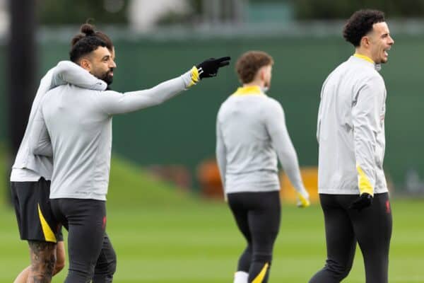 LIVERPOOL, ENGLAND - Monday, December 9, 2024: Liverpool's Mohamed Salah interacts with team-mate Darwin Núñez (obscured) and Curtis Jones (R) during a training session at the AXA Training Centre ahead of the UEFA Champions League match between Girona FC and Liverpool FC. (Photo by Jessica Hornby/Propaganda)