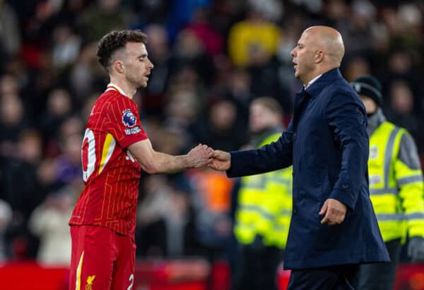 LIVERPOOL, ENGLAND - Saturday, December 14, 2024: Liverpool's Diogo Jota (L) and head coach Arne Slot after the FA Premier League match between Liverpool FC and Fulham FC at Anfield. (Photo by David Rawcliffe/Propaganda)