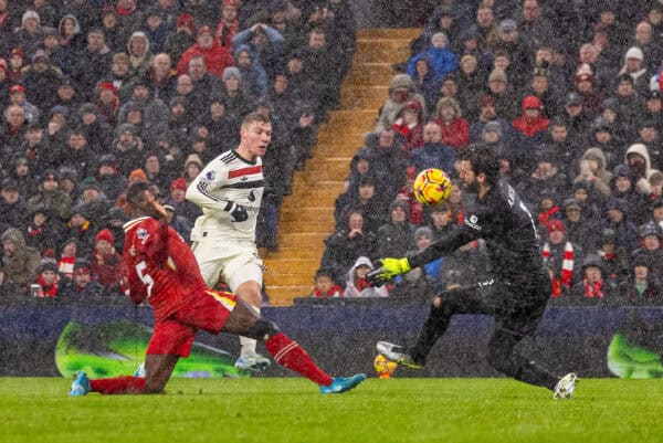 LIVERPOOL, ENGLAND - Sunday, January 5, 2025: Liverpool's goalkeeper Alisson Becker makes a save from Manchester United's Rasmus Højlund during the FA Premier League match between Liverpool FC and Manchester United FC at Anfield. (Photo by David Rawcliffe/Propaganda)