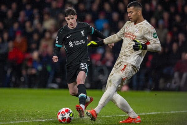 EINDHOVEN, NETHERLANDS - Wednesday, January 29, 2025: Liverpool's James McConnell (L) challenges PSV Eindhoven's goalkeeper Walter Benítez during the UEFA Champions League Matchday 8 game between PSV Eindhoven and Liverpool FC at the Philips Stadion. (Photo by David Rawcliffe/Propaganda)