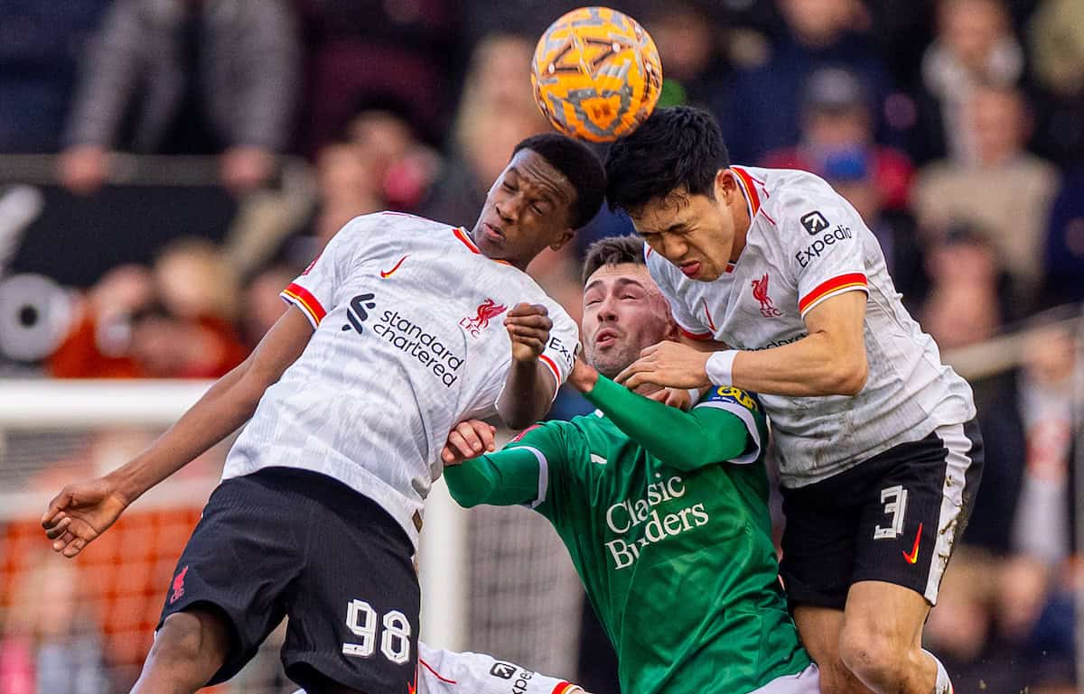 PLYMOUTH, ENGLAND - Sunday, February 9, 2025: Liverpool's Trey Nyoni (L) and Wataru End? (R) challenge for a header with Plymouth Argyle's Ryan Hardie during the FA Cup 4th Round match between Plymouth Argyle FC and Liverpool FC at Home Park. (Photo by David Rawcliffe/Propaganda)