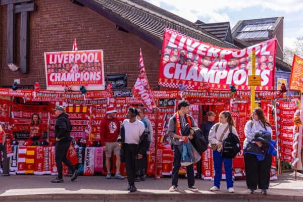 LIVERPOOL, ENGLAND - Sunday, April 27, 2025: A street vendor sells scarves and flags with "Champions" on ahead of the FA Premier League match between Liverpool FC and Tottenham Hotspur FC at Anfield. (Photo by David Rawcliffe/Propaganda)