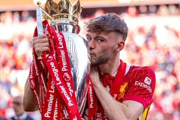 LIVERPOOL, ENGLAND - Sunday, May 25, 2025: Liverpool's Conor Bradley kisses the trophy, as the team celebrate becoming Champions for the 20th time, after the FA Premier League match between Liverpool FC and Crystal Palace FC at Anfield. (Photo by David Rawcliffe/Propaganda)