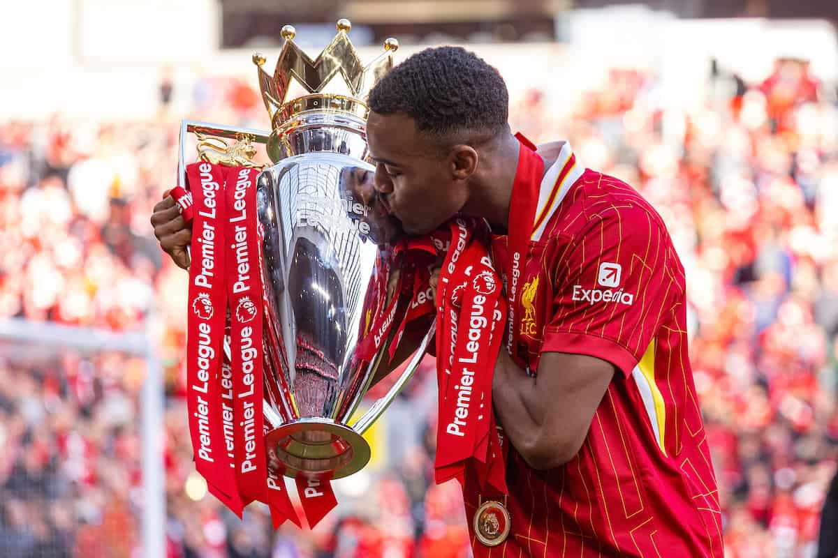 LIVERPOOL, ENGLAND - Sunday, May 25, 2025: Liverpool's Ryan Gravenberch kisses the trophy, as the team celebrate becoming Champions for the 20th time, after the FA Premier League match between Liverpool FC and Crystal Palace FC at Anfield. (Photo by David Rawcliffe/Propaganda)