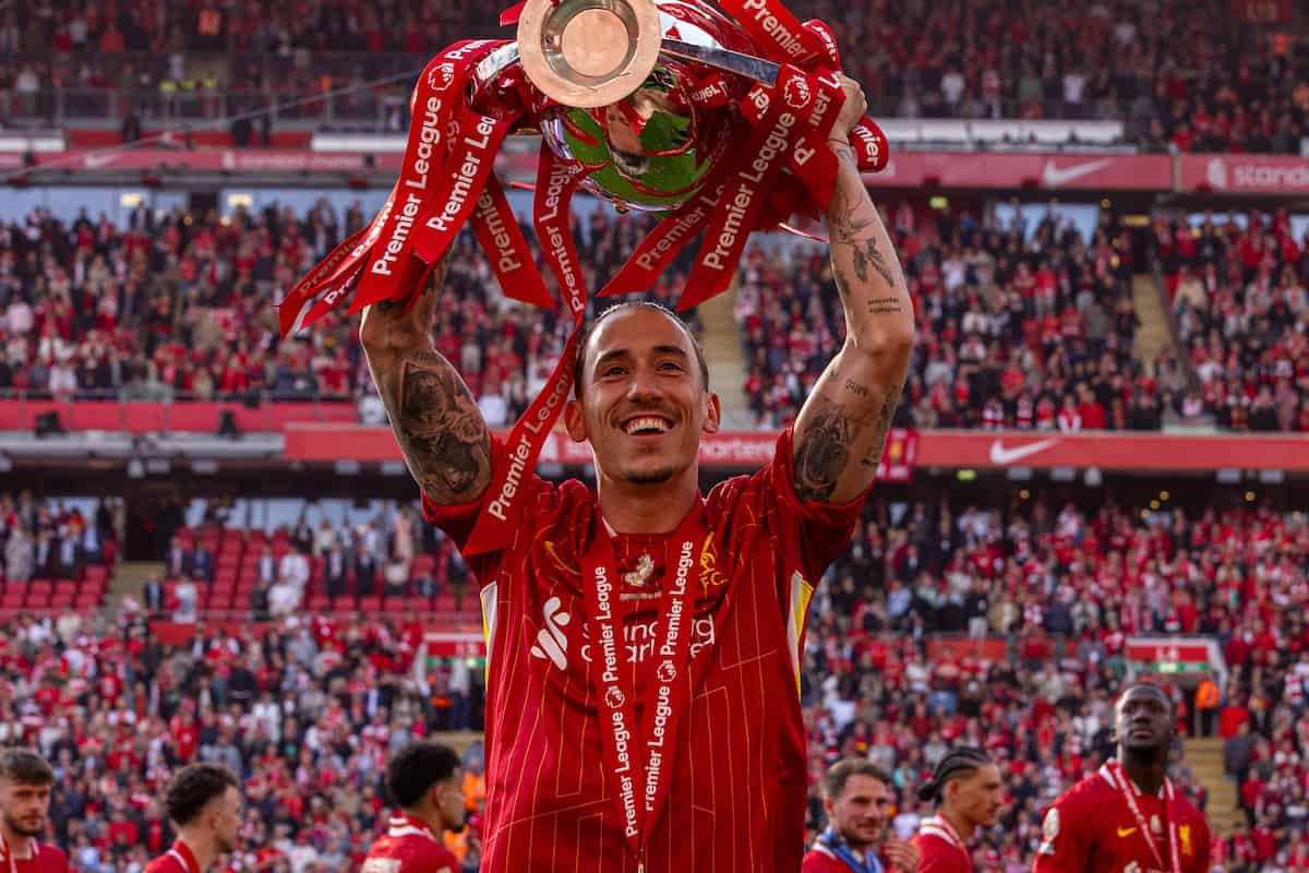 LIVERPOOL, ENGLAND - Sunday, May 25, 2025: Liverpool's Kostas Tsimikas lifts the trophy, as the team celebrate becoming Champions for the 20th time, after the FA Premier League match between Liverpool FC and Crystal Palace FC at Anfield. (Photo by David Rawcliffe/Propaganda)