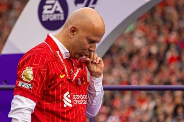 LIVERPOOL, ENGLAND - Sunday, May 25, 2025: Liverpool's head coach Arne Slot kisses his medal, as the Reds celebrate being crowned Champions for the 20th time, during the FA Premier League match between Liverpool FC and Crystal Palace FC at Anfield. (Photo by David Rawcliffe/Propaganda)