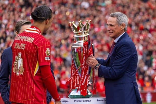 LIVERPOOL, ENGLAND - Sunday, May 25, 2025: Liverpool's Virgil van Dijk is presented with the trophy by former Liverpool captain Alan Hansen, as the Reds celebrate being crowned Champions for the 20th time, during the FA Premier League match between Liverpool FC and Crystal Palace FC at Anfield. (Photo by David Rawcliffe/Propaganda)