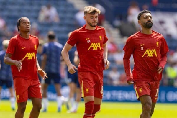 PRESTON, ENGLAND - Sunday, July 13, 2025: Liverpool's (L-R) Rio Ngumoha, Conor Bradley and Mohamed Salah during the pre-match warm-up before a pre-season friendly match between Preston North End FC and Liverpool FC at Deepdale. (Photo by David Rawcliffe/Propaganda)