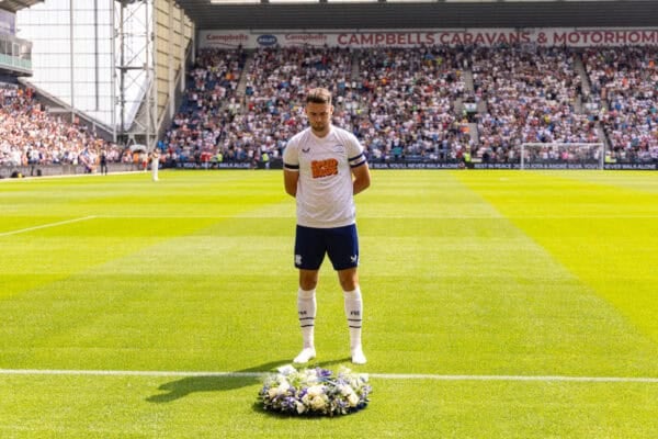 PRESTON, ENGLAND - Sunday, July 13, 2025: Preston North End's captain Ben Whiteman lays a wreath in front of the Liverpool away fans in memory of Diogo Jota and Andre Silva before a pre-season friendly between Preston North End and Liverpool at Deepdale.  (Photo by David Rawcliffe/Propaganda)