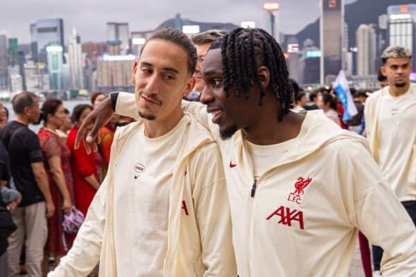 HONG KONG - Monday, July 21, 2025: Liverpool's Kostas Tsimikas (L) and Jeremie Frimpong during a team walk along the Avenue of Stars after the squad arrived at the Rosewood Hotel in Hong Kong ahead of the Hong Kong Football Festival 2025 pre-season tournament. (Photo by David Rawcliffe/Propaganda)