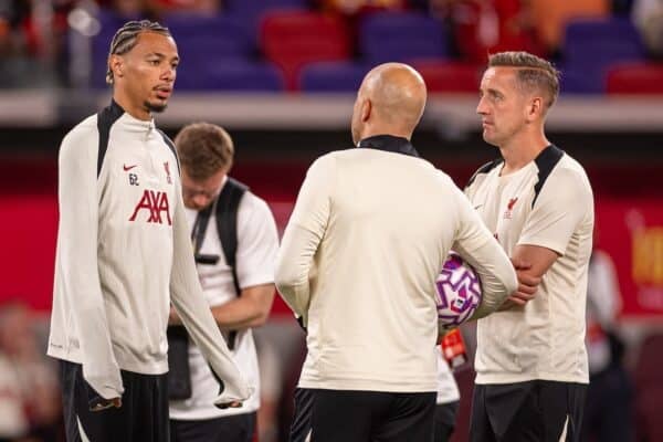 HONG KONG - Thursday, July 24, 2025: Liverpool's new signing Hugo Ekitike (L) chats with head coach Arne Slot during a training session at the Kai Tak Stadium in Hong Kong ahead of the Hong Kong Football Festival 2025 pre-season tournament, on Day Four of the club's Asia Tour. (Photo by David Rawcliffe/Propaganda)