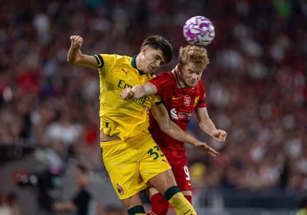 HONG KONG - Saturday, July 26, 2025: Liverpool's Luca Stephenson (R) challenges for a header with AC Milan's Davide Bartesaghi during the Hong Kong Football Festival 2025 pre-season match against AC Milan at the Kai Tak Stadium in Hong Kong on Day Six of the club's Asia Tour. (Photo by David Rawcliffe/Propaganda)