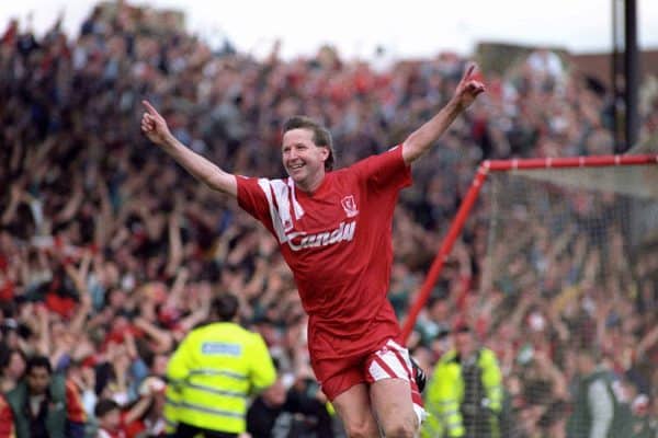 Liverpool's Ronnie Whelan celebrates scoring the equalizing goal 3 minutes from time to earn a replay