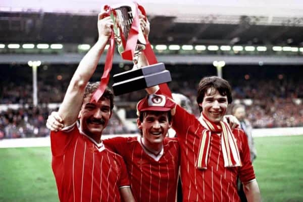 Delighted Liverpool players (from left) Graham Souness, Kenny Dalglish and Alan Hansen celebrate with the Milk Cup trophy after they defeated Manchester United 2-1 in extra time at Wembley. It was Liverpool's third successive triumph in the competition, giving manager Bob Paisley a winning farewell to Wembley etires at the end of the season.