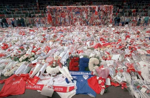 April 17, 1989, floral tributes are placed by soccer fans at the 'Kop' end of Anfield Stadium in Liverpool, England, on April 17, 1989, after the Hillsborough April 15 tragedy when fans surged forward during the Cup semi-final between Liverpool and Nottingham Forest at Hillsborough Stadium killing 96 people. (Picture by: Peter Kemp / AP/Press Association Images)