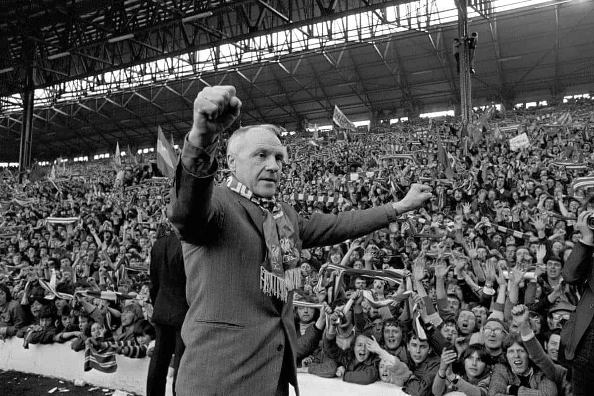 Liverpool's legendary Bill Shankly. Turning towards the Kop end of Anfield, Shankly gets an ovation from the fans who idolised him when Liverpool became League champions.