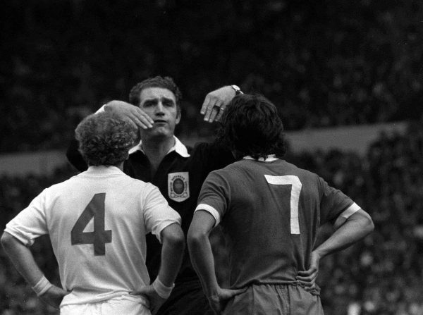 Leeds United's captain Billy Bremner (No 4) and Liverpool's Kevin Keegan are both dismissed by Referee Reg Matthewson, after they both clashed during the 1974 FA Charity Shield football match at Wembley in London.