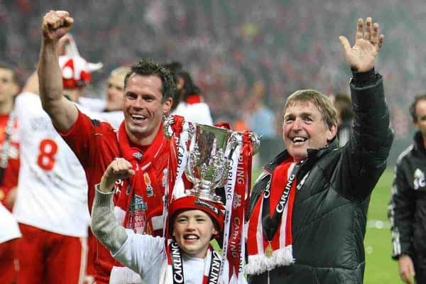 Liverpool's manager Kenny Dalglish (right) and Jamie Carragher (left) celebrate after the game