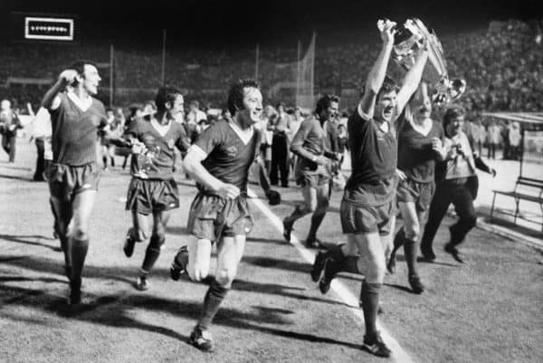 Liverpool captain Emlyn Hughes holds aloft the European Cup along with his victorius teammates after the English club beat German side Borussia Moenchengladbach in the final held in Rome, Italy.