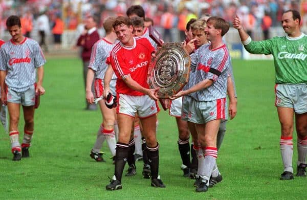 Liverpool's Ronnie Whelan and Manchester United's Steve Bruce with the Charity Sheild