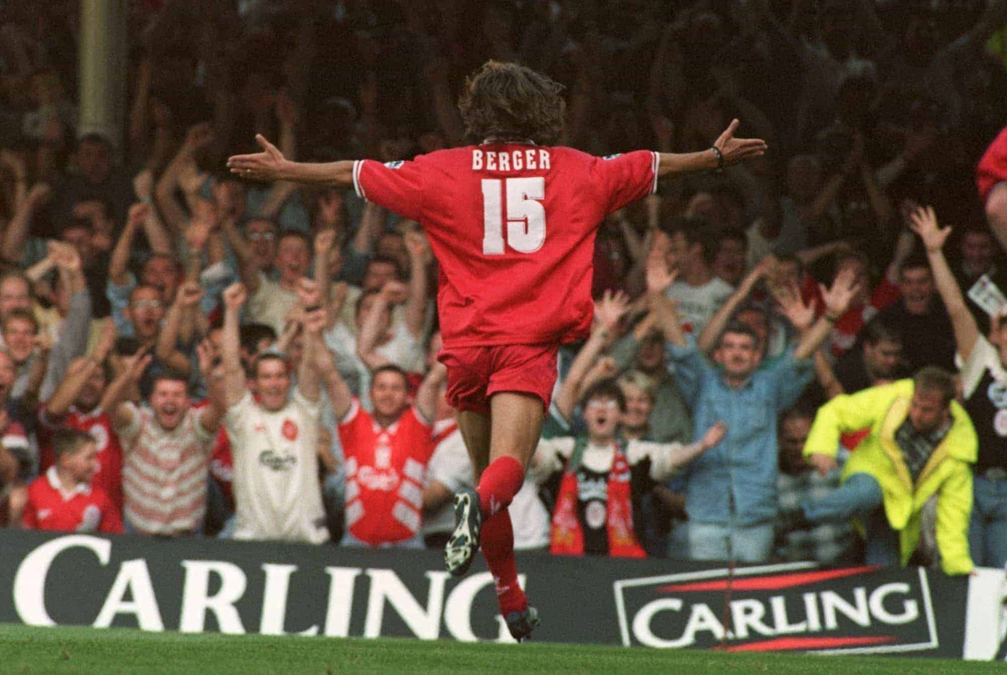 Patrik Berger races over to the Liverpool fans after scoring his second goal