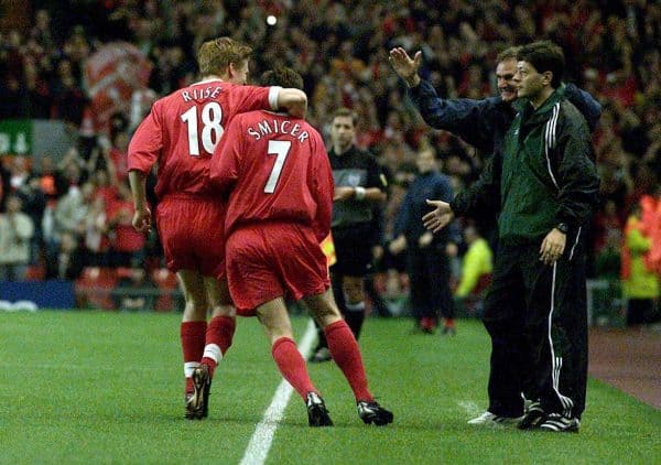 Liverpools Vladimir Smicer celebrates his goal with John Arne Riise as Phil Thompson (right) looks on during the Champions League group B match at Anfield, Liverpool, 2001 (PA Images)