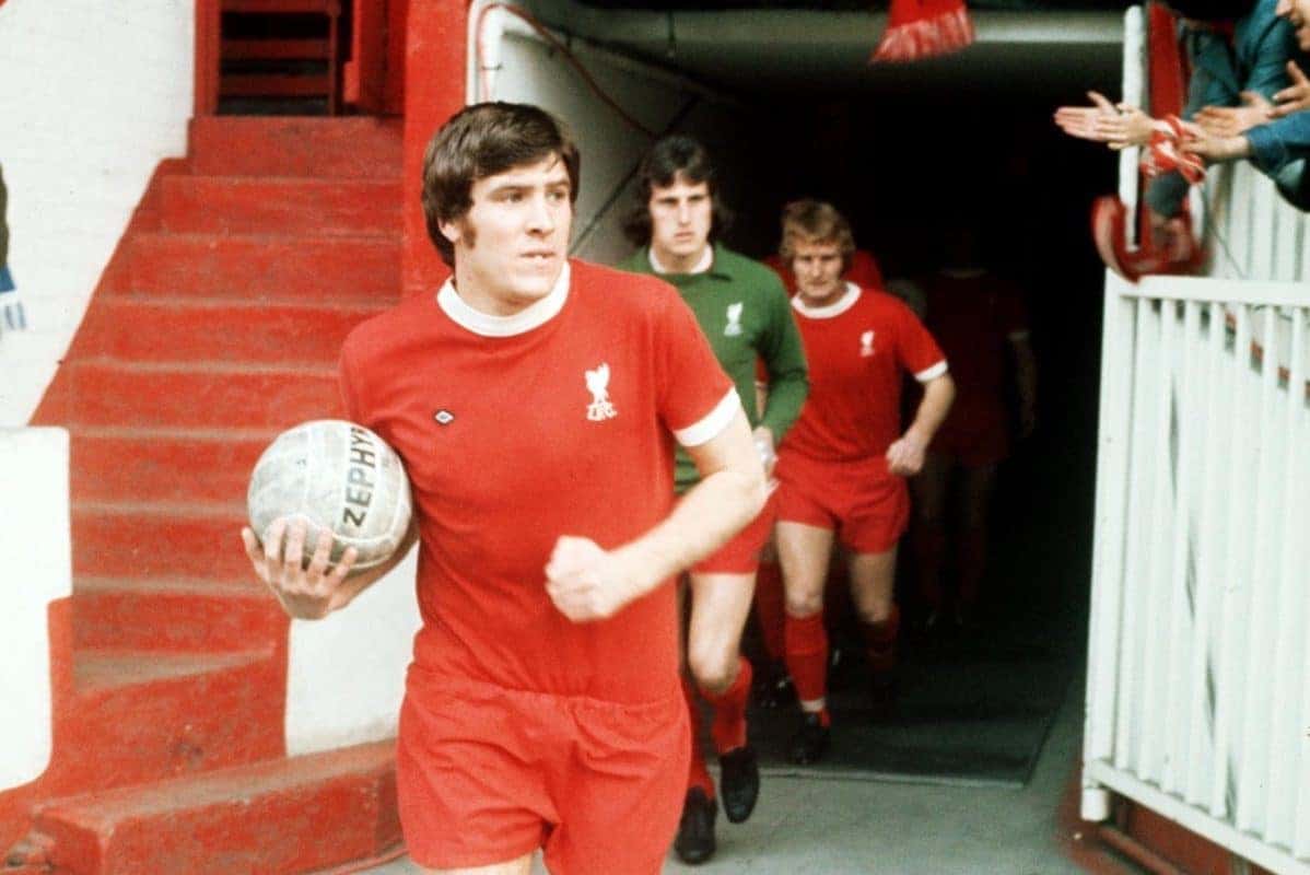 Emlyn Hughes, captain of Liverpool FC leads his side out at Anfield.