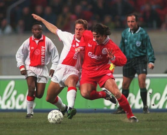 Frank De Boer, Ajax and Liverpool's Jamie Redknapp battle for the ball