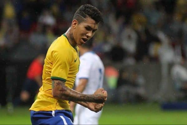 Brazil's Roberto Firmino celebrates after scoring a goal during a friendly soccer match against Honduras in Porto Alegre, Brazil, Wednesday, June 10, 2015. Brazil is preparing for the Copa America which begins Thursday in Chile. (AP Photo/Nabor Goulart)