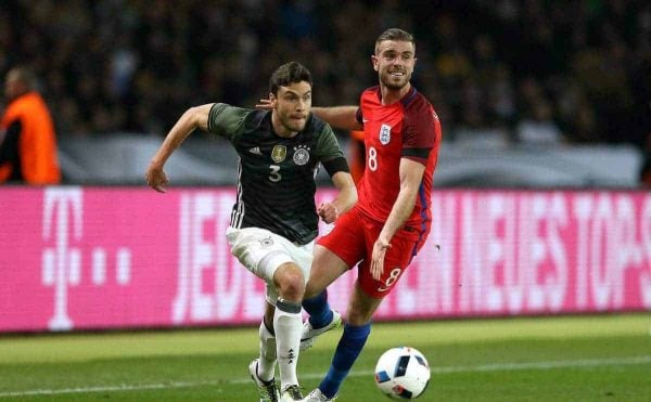 England's Jordan Henderson and Germany's Jonas Hector (left) in action during the International Friendly match at the Olympic Stadium, Berlin. PRESS ASSOCIATION Photo. Picture date: Saturday March 26, 2016. See PA story SOCCER Germany. Photo credit should read: Adam Davy/PA Wire.