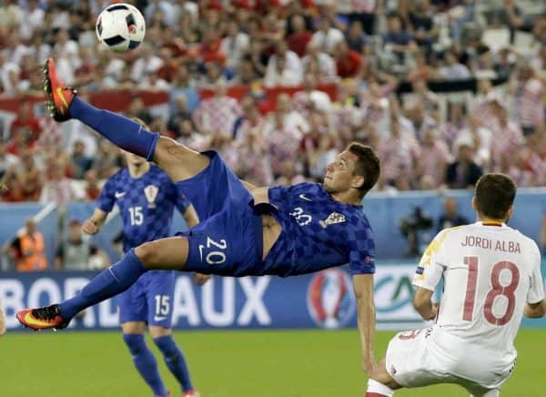 Croatia's Marko Pjaca goes for an overhead kick during the Euro 2016 Group D soccer match between Croatia and Spain at the Nouveau Stade in Bordeaux, France, Tuesday, June 21, 2016. (AP Photo/Petr David Josek)