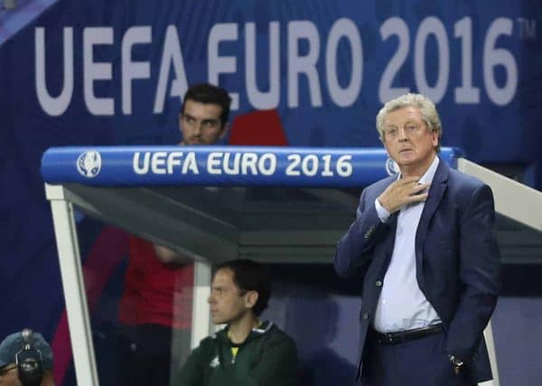 England coach Roy Hodgson stands on the sidelines during the Euro 2016 round of 16 soccer match between England and Iceland, at the Allianz Riviera stadium in Nice, France, Monday, June 27, 2016. (AP Photo/Claude Paris)