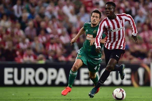Athletic Bilbao's Inaki Williams, right, chase the ball with Rapid Wien's Thomas Schrammel during the Europa League Group F soccer match between Athletic Bilbao and Rapid Wien, at San Mames stadium, in Bilbao, northern Spain, Thursday, Sept. 29, 2016. Athletic Bilbao won 1-0.(AP Photo/Alvaro Barrientos)