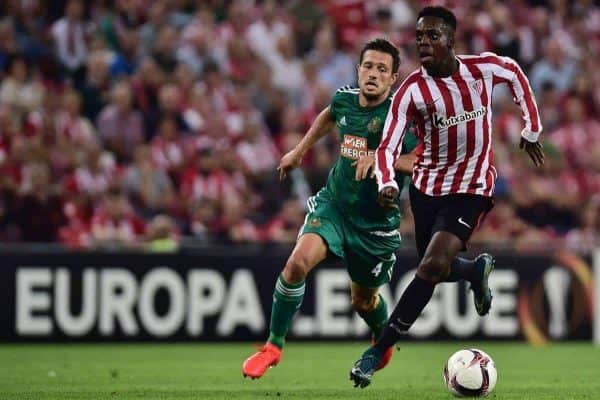 Athletic Bilbao's Inaki Williams, right, chase the ball with Rapid Wien's Thomas Schrammel during the Europa League Group F soccer match between Athletic Bilbao and Rapid Wien, at San Mames stadium, in Bilbao, northern Spain, Thursday, Sept. 29, 2016. Athletic Bilbao won 1-0.(AP Photo/Alvaro Barrientos)