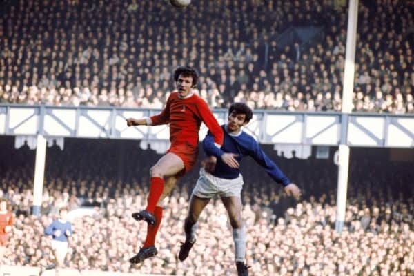 Liverpool's John Toshack (left) beats Everton's Henry Newton (right) in the air, 1972 ( Peter Robinson/EMPICS Sport)