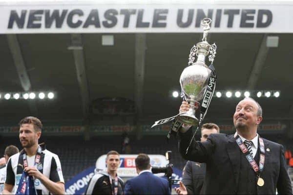 Newcastle United manager Rafa Benitez celebrates with the Sky Bet Championship trophy after the final whistle during the Sky Bet Championship match at St James' Park, Newcastle.