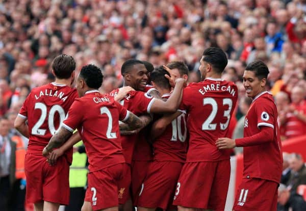 Liverpool's Philippe Coutinho (no. 10) celebrates scoring his side's second goal of the game with team-mates during the Premier League match at Anfield, Liverpool.