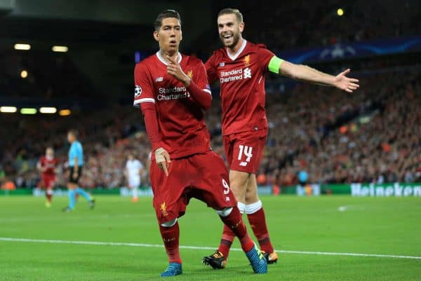 Liverpool's Roberto Firmino celebrates scoring his side's fourth goal of the game with team mate Liverpool's Jordan Henderson