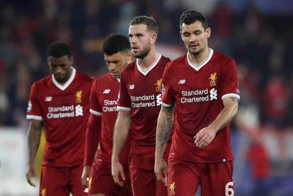 Left to right, Liverpool's Georginio Wijnaldum, Alex Oxlade-Chamberlain, Jordan Henderson and Dejan Lovren look dejected after the game