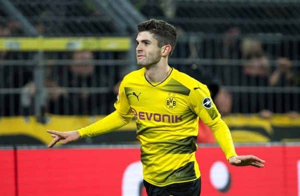 Dortmund's Christian Pulisic cheers over his 2-1 score during the German Bundesliga soccer match between Borussia Dortmund and 1899 Hoffenheim at the Signal Iduna Park in Dortmund, Germany, 16 December 2017. Photo: Guido Kirchner/dpa