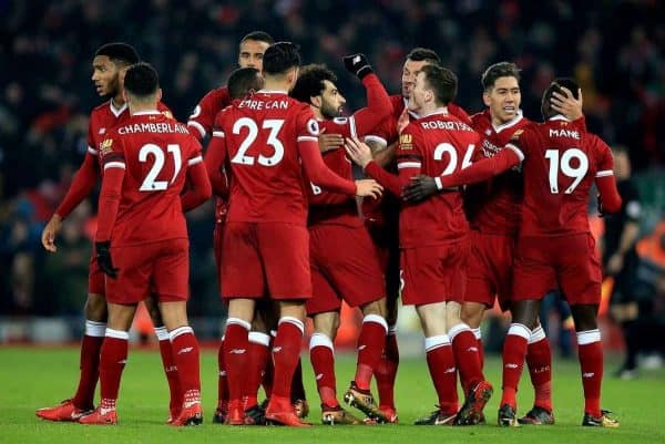 Liverpool's Mohamed Salah (centre) celebrates scoring his side's fourth goal of the game during the Premier League match at Anfield, Liverpool.